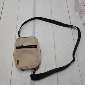 Brixley tan small crossbody bag adjustable convertible zip desert